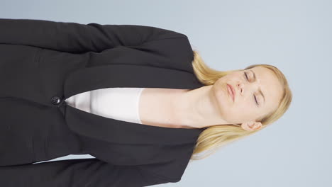 Vertical-video-of-Tired-business-woman.